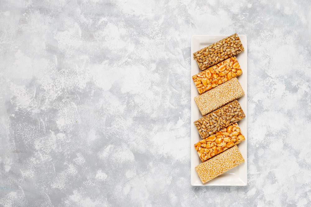 granola-bar-healthy-sweet-dessert-snack-sesame-peanut-sunflower-honey-gozinaki-is-georgian-national-food-oriental-sweet-top-view-concrete