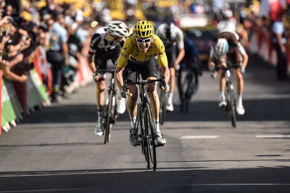 great-britains-geraint-thomas-wearing-the-overall-leaders-news-photo-1001873724-1532016327