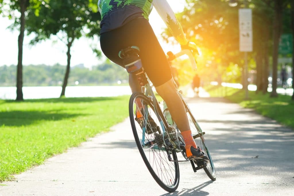 Ride on bike on the road in the city park. Sport and active life