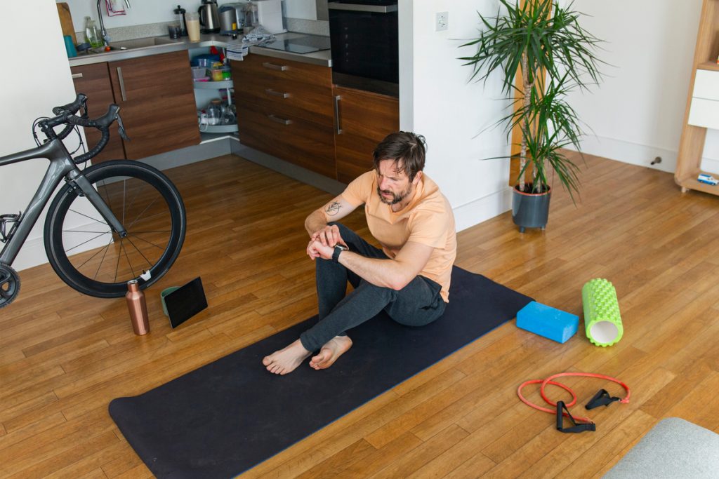 Man checking his smartwatch post workout