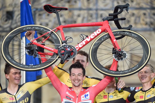 team-jumbos-slovenian-rider-primoz-roglic-holds-his-bike-up-news-photo-1630959580