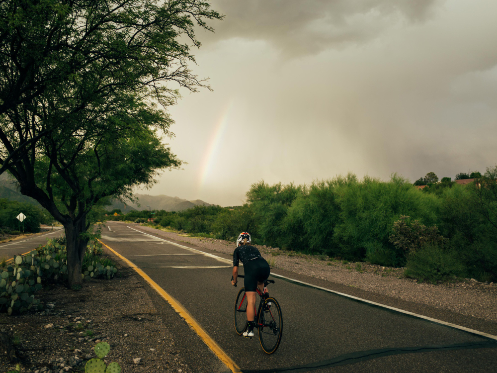 horizontal-photo-female-cyclist-motion-who-rides-bike-road-nature