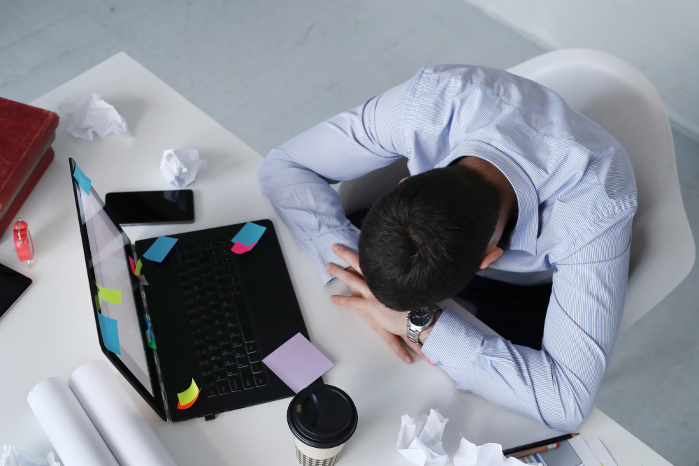 man-sleeping-work