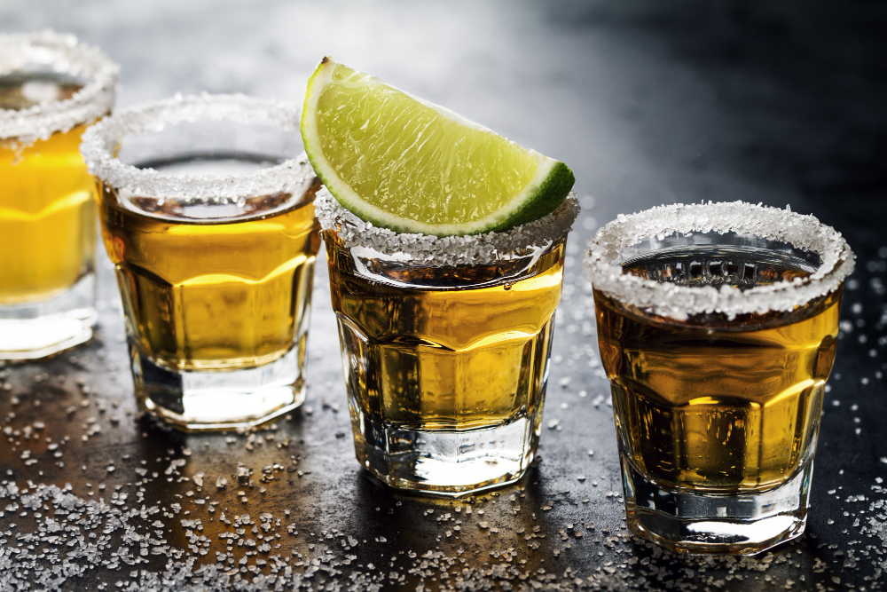 tasty-alcohol-drink-cocktail-tequila-with-lime-salt-vibrant-dark-background-closeup-horizontal