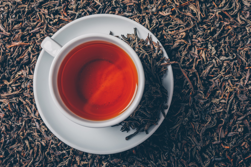 cup-tea-tea-herbs-background-top-view