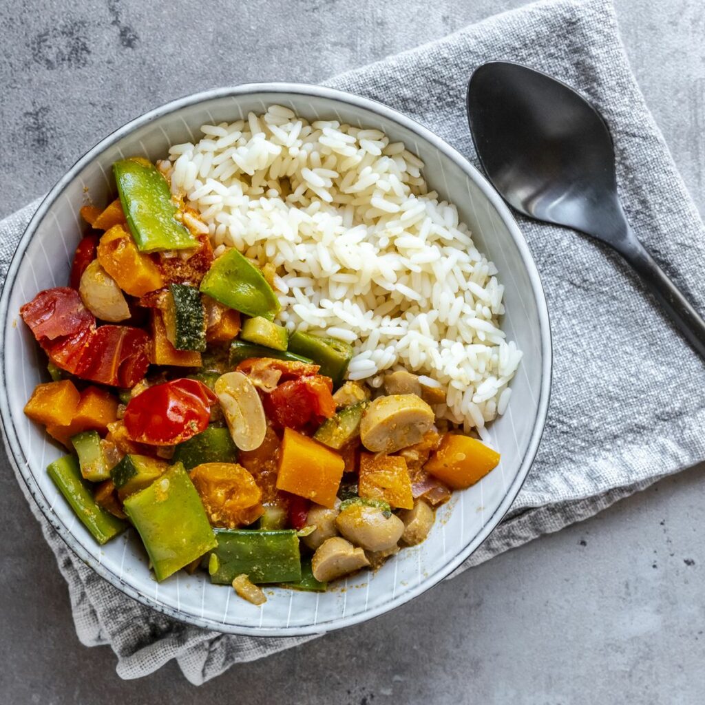 bowl-of-vegan-sweet-potatoe-curry-with-rice-royalty-free-image-1674692591