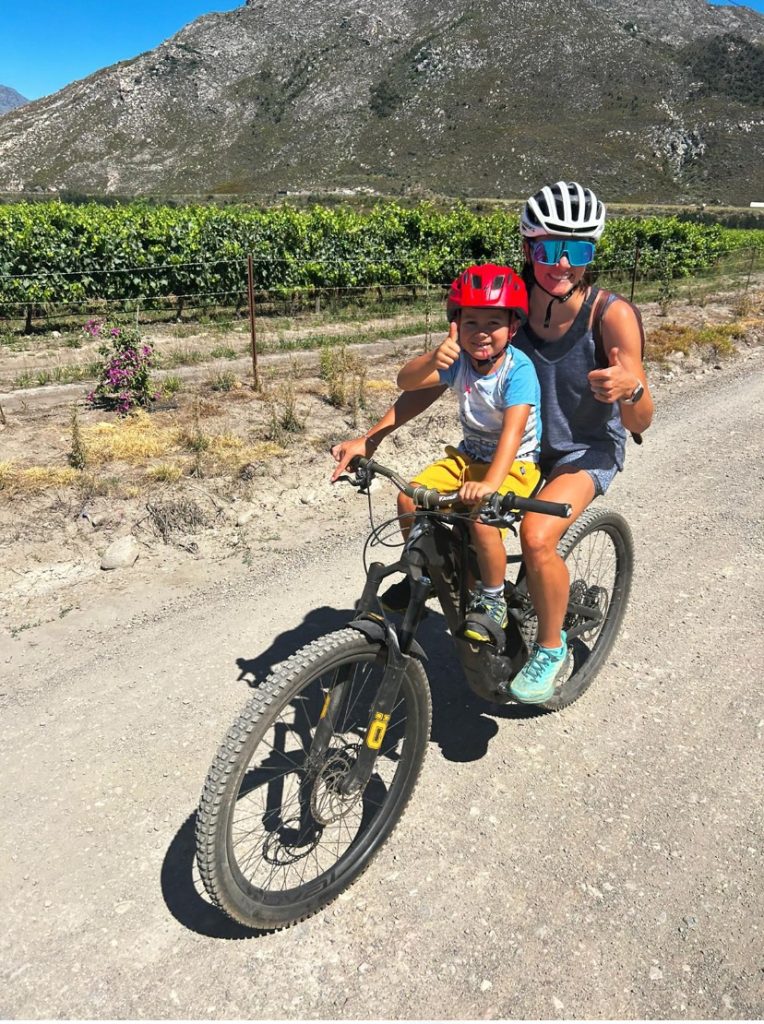 Cherise Willeit with her son riding a bike