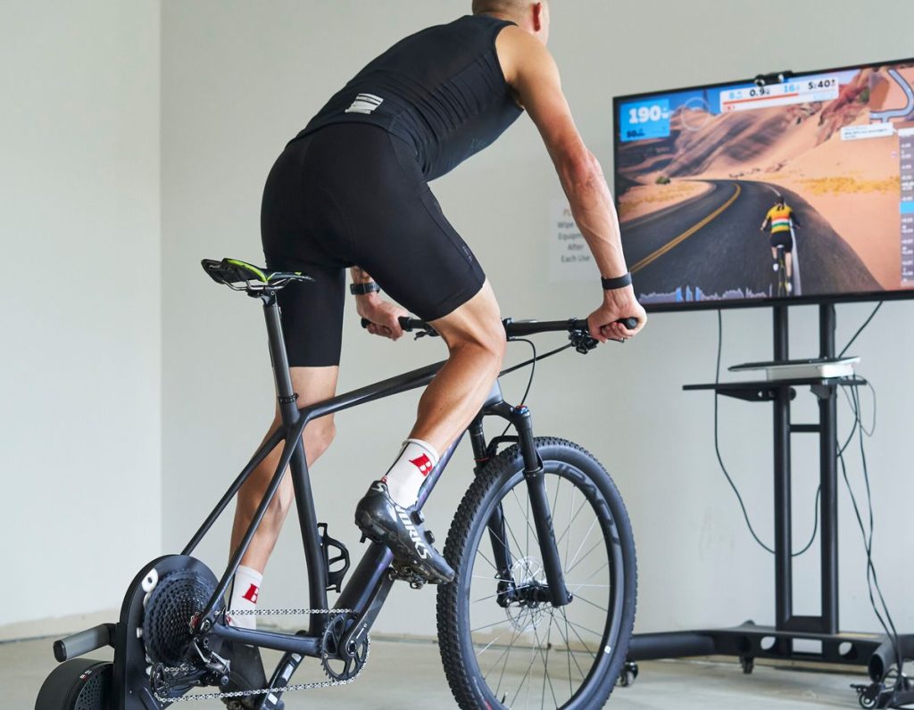 A cyclist on an indoor trainer