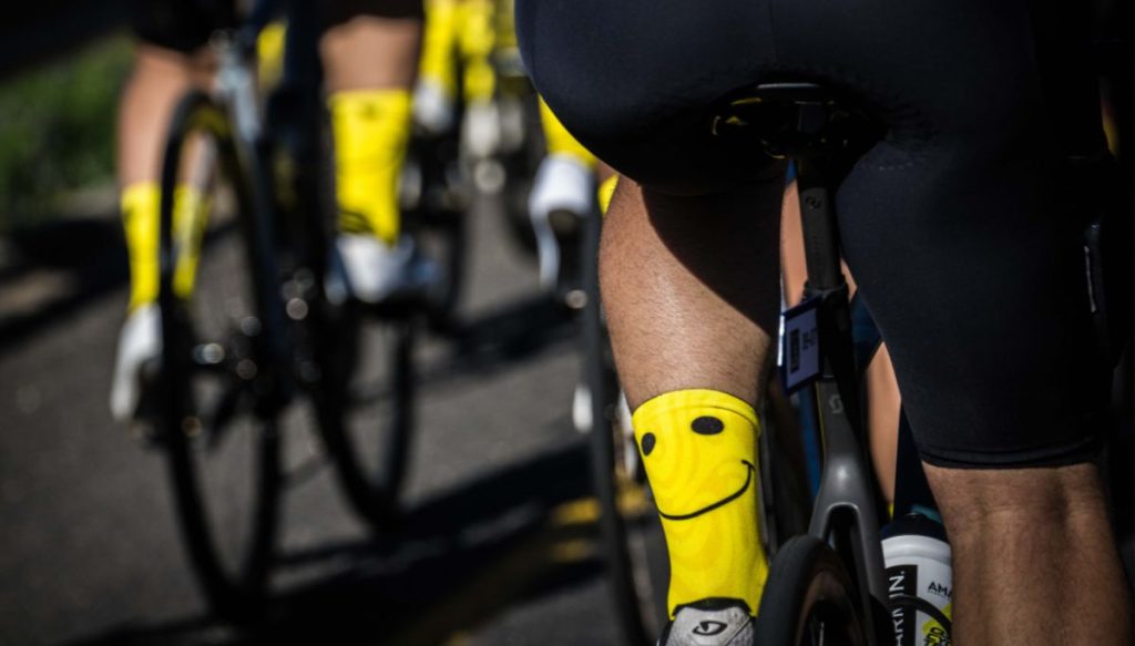 A rider with bright yellow socks, riding the Double Century