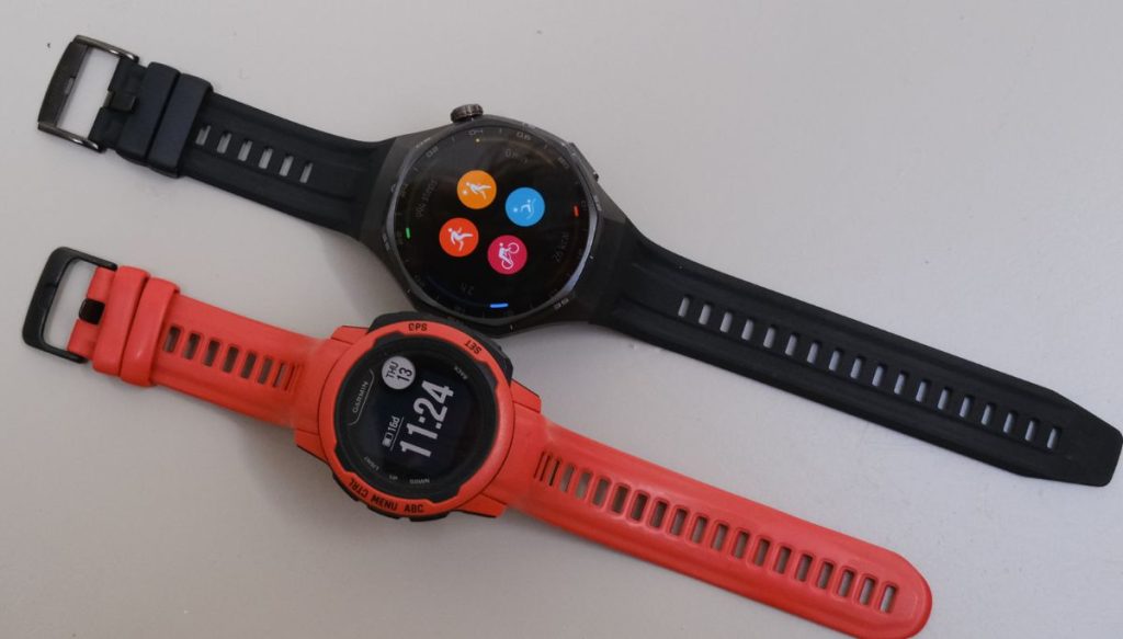 A garmin and a Huawei GT 6 Pro next to each other