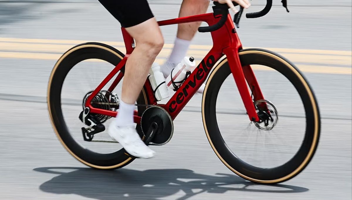 A cyclist riding a 1x drivetrain road bike