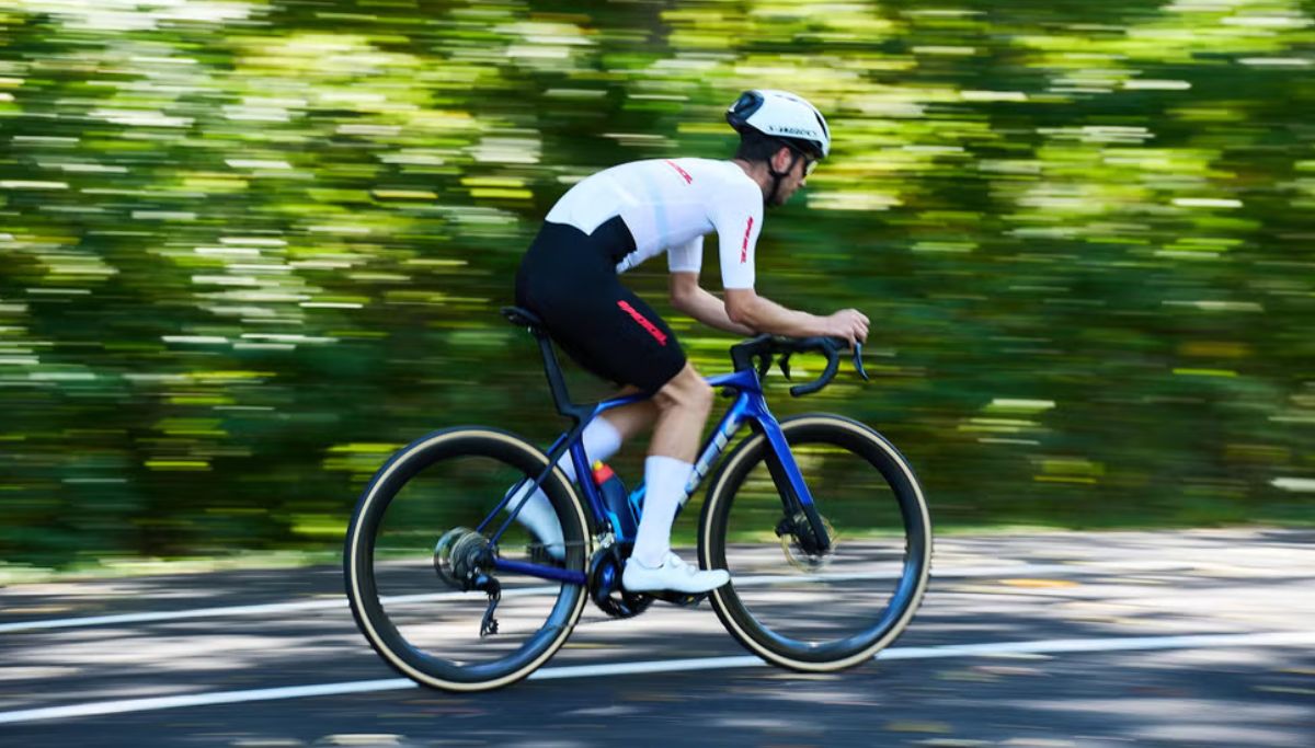 A cyclist riding fast
