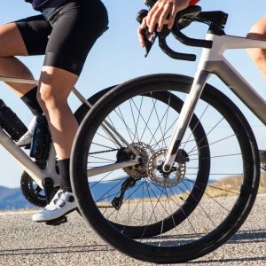 A couple cycling showing their knees