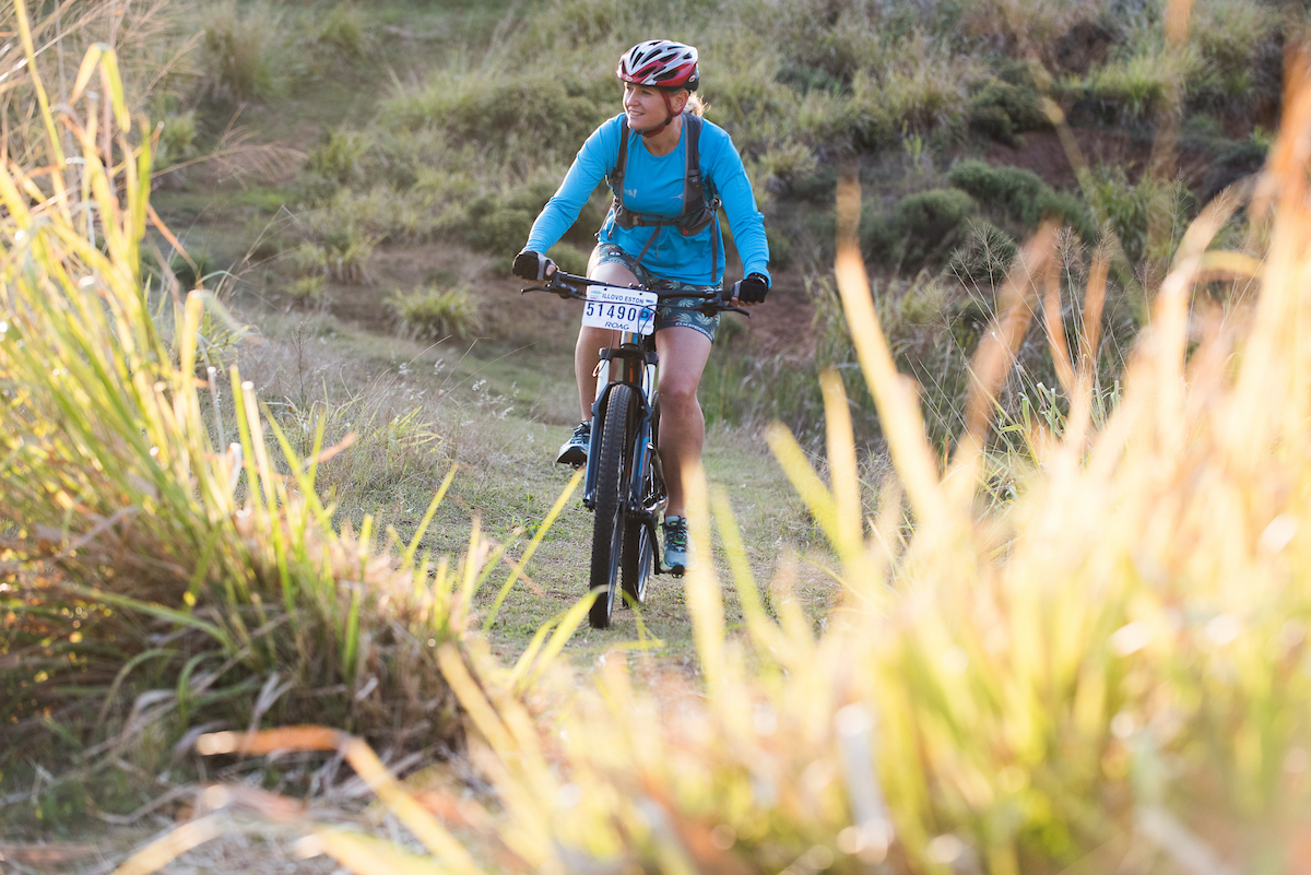 A lady cycling at Simbithi Eco-Estate
