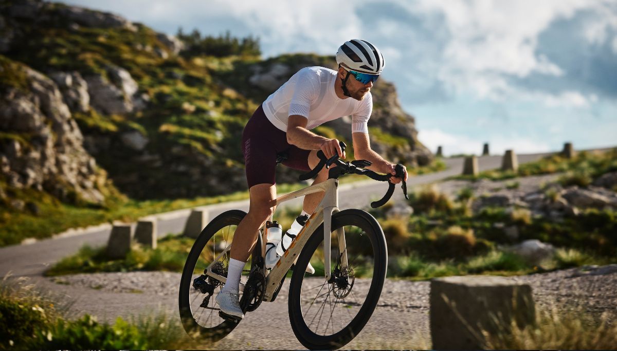 A cyclist riding the new Trek Domane Carbon road bike