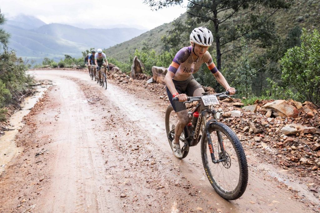 Chloé Hopf enjoying the increased grip and confidence on a mountain bike on the flood-rutted Prince Alfred’s Pass. Photo by Oakpics.com.