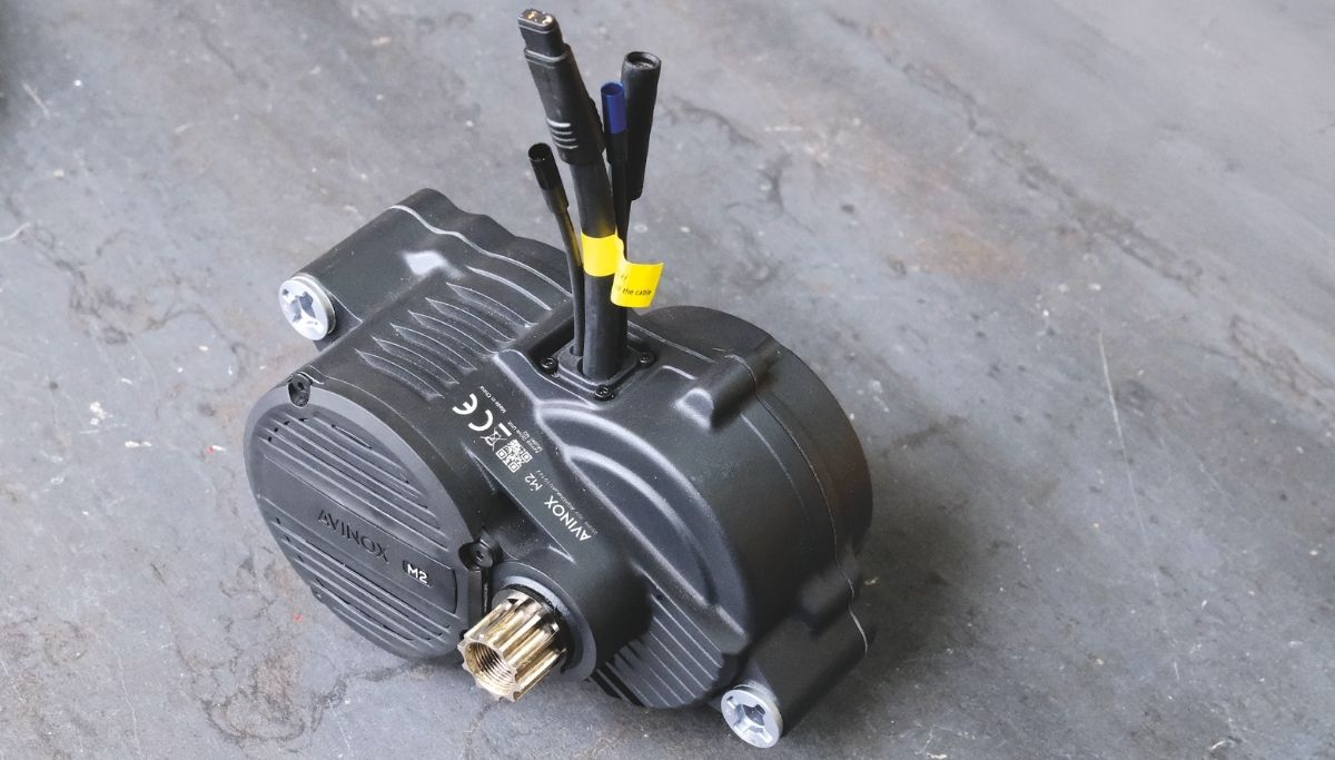 An Avinox M2 motor that Dayle Holmes used during the Alterra design phase, on a workbench at Outer HQ.